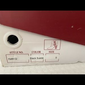 Only worn once. Black suede ankle boots.